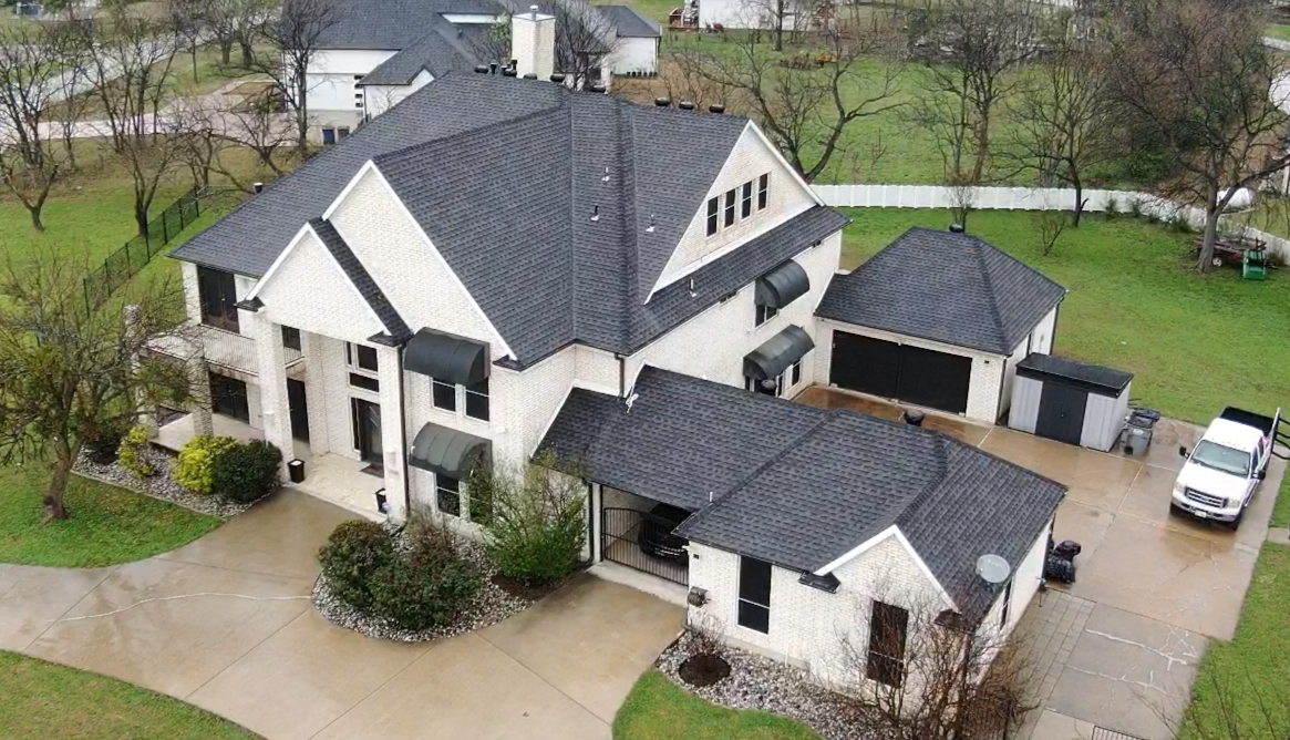Aerial drone view of a large residential roof